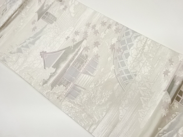 プラチナ箔寺院に蛇籠・紅葉風景模様織出し袋帯